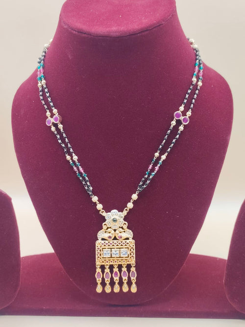 Designer Dual-Line Black Beads Mangalsutra with Temple-Inspired Pendant