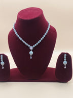 Shimmering American Diamond Silver-Plated Necklace with Rose Pink Stone Drop
