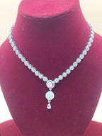 Shimmering American Diamond Silver-Plated Necklace with Rose Pink Stone Drop
