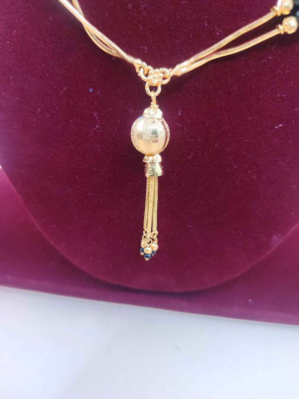 Traditional Black Beads Gold-Finish Chain with Elegant Tassel Pendant