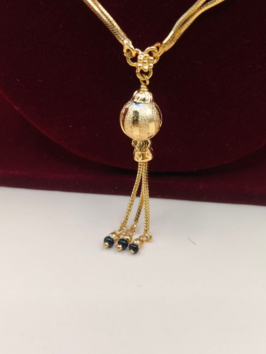 Traditional Black Beads Gold-Finish Chain with Elegant Tassel Pendant