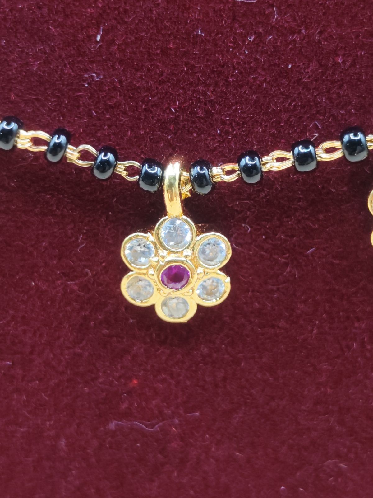 Floral Black Beads Mangalsutra with Gold-Tone Flower Charms