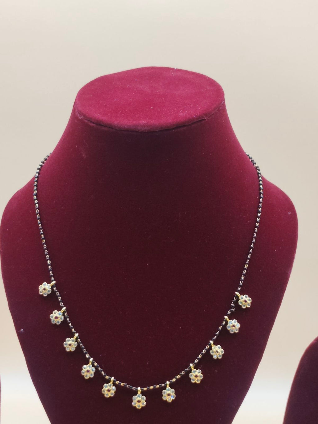 Floral Black Beads Mangalsutra with Gold-Tone Flower Charms