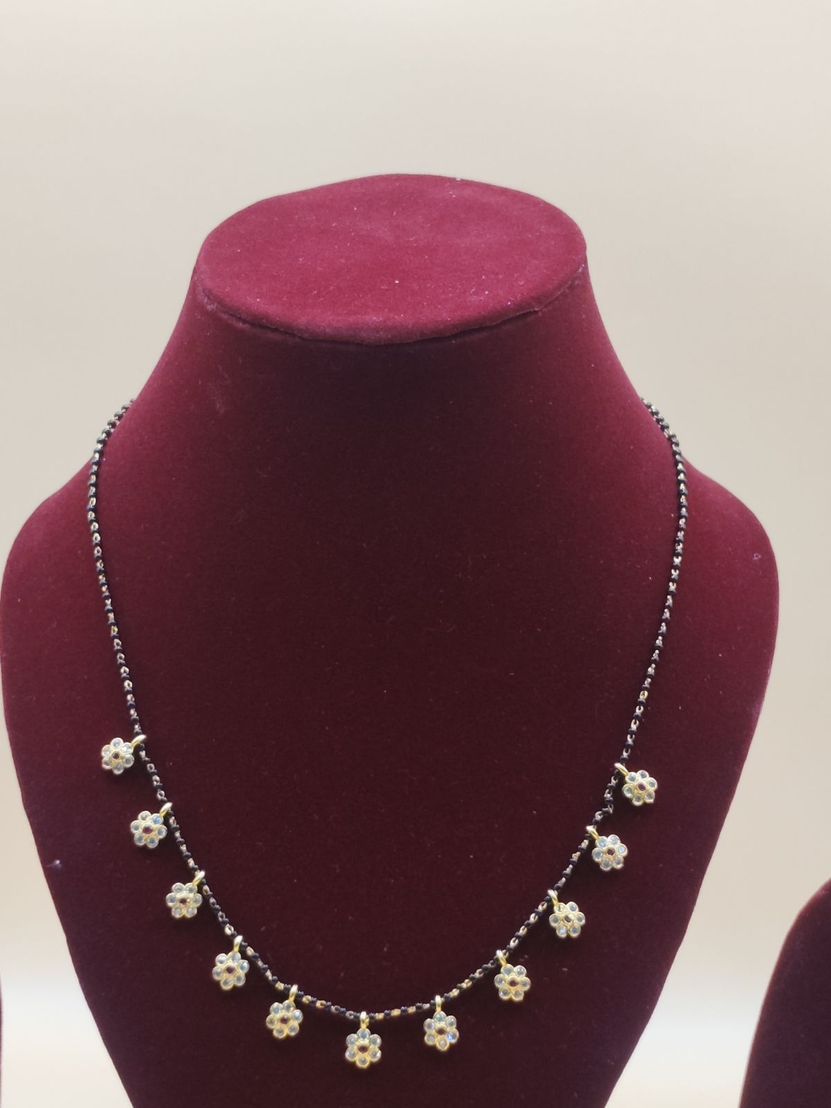 Floral Black Beads Mangalsutra with Gold-Tone Flower Charms
