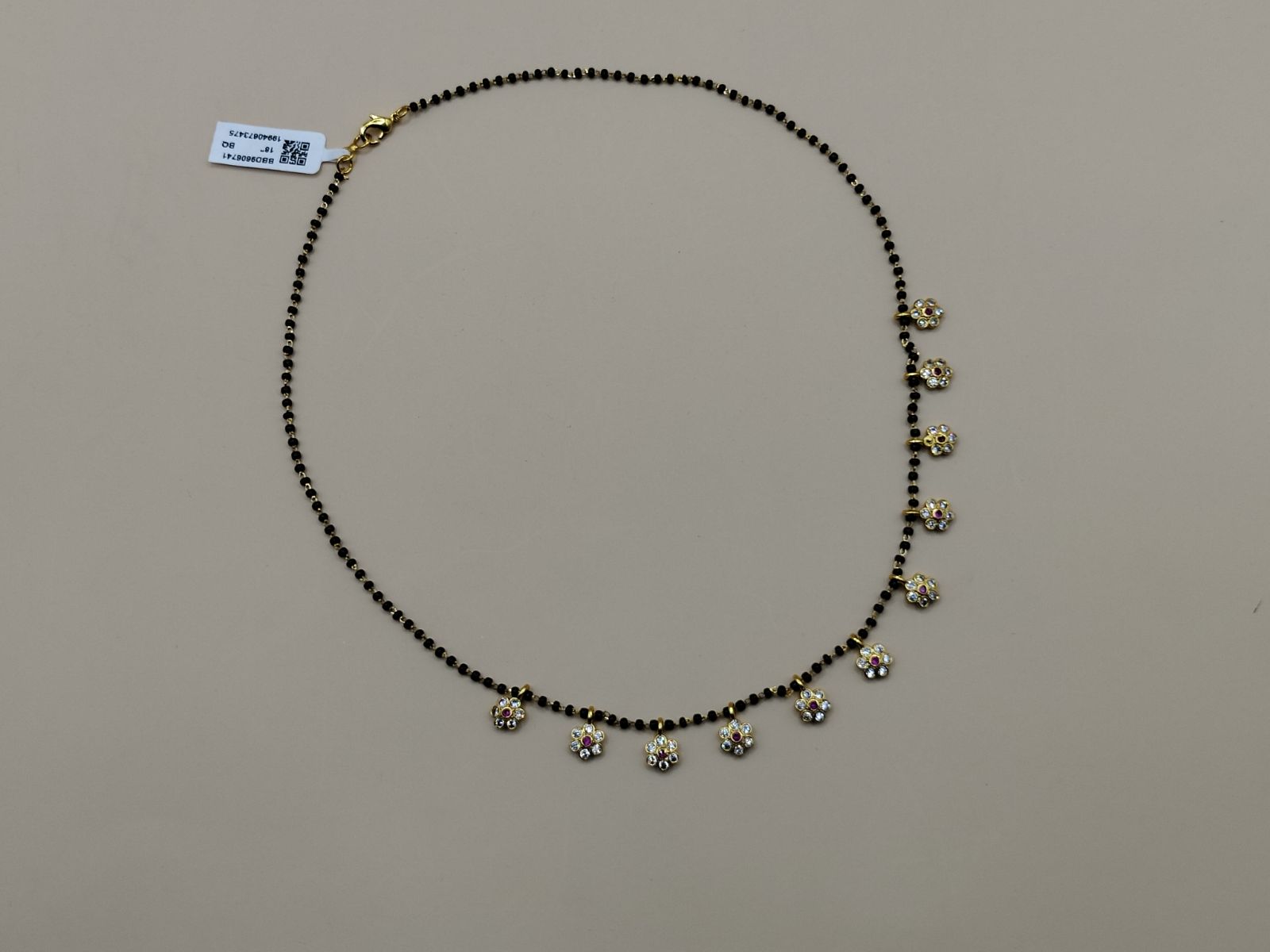 Floral Black Beads Mangalsutra with Gold-Tone Flower Charms