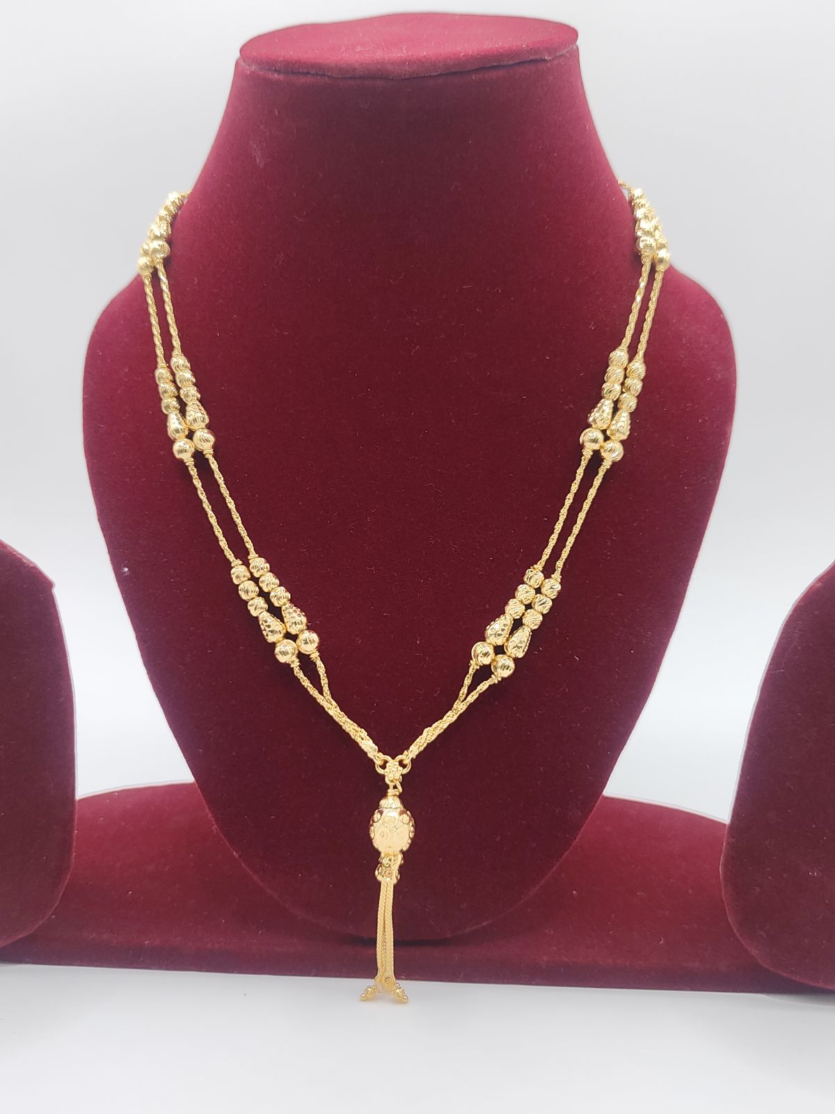 Gold-Finish Beaded Long Chain with Tassel Pendant