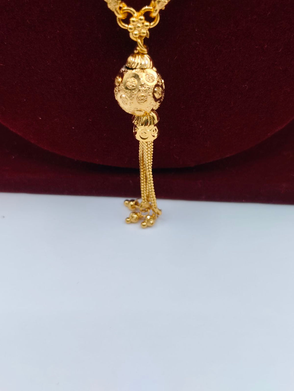 Gold-Finish Beaded Long Chain with Tassel Pendant