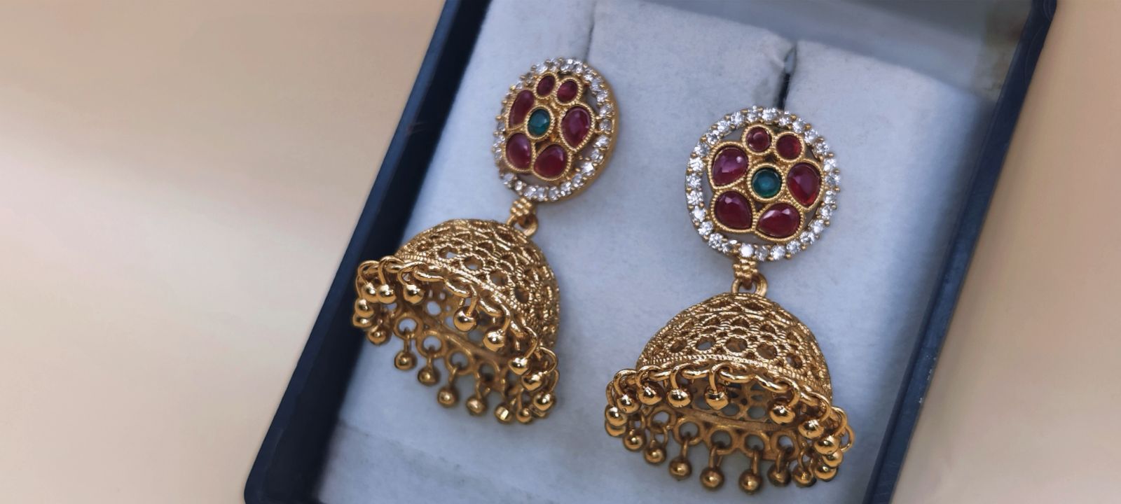 Antique Gold Jhumka Earrings with Ruby-Green Stone Studs