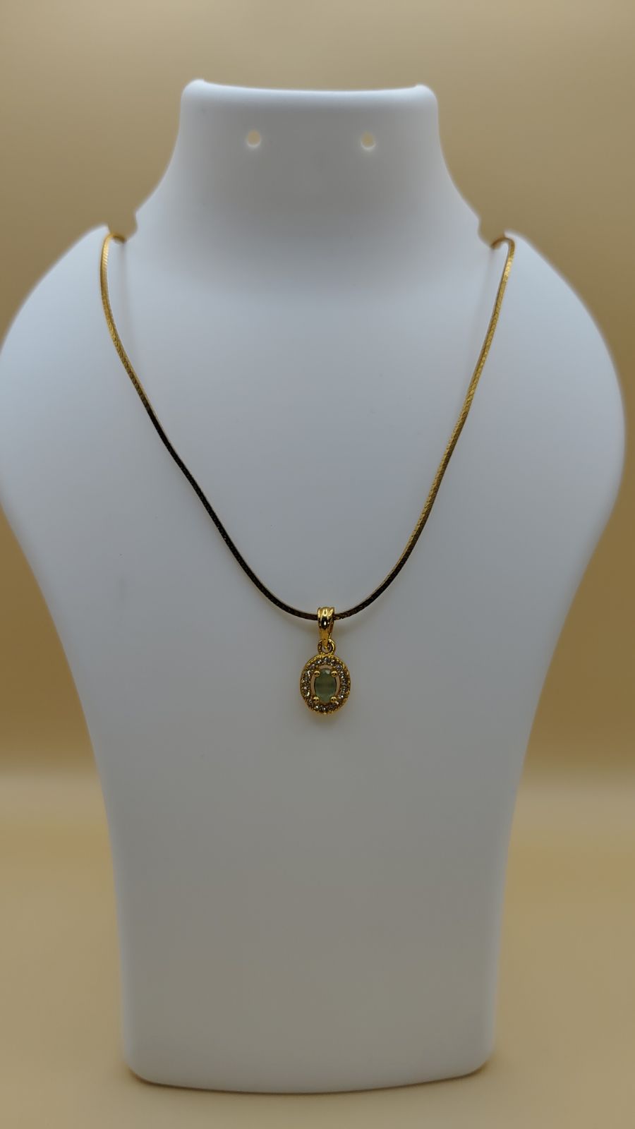 Gold Chain with Green Stone Pendant