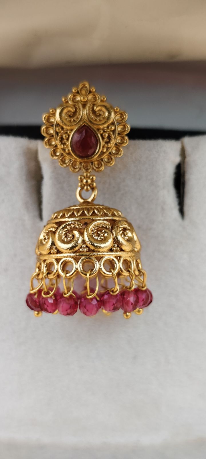 Traditional Gold-Tone Jhumka Earrings with Red Stones