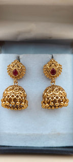 Traditional Gold-Finish Jhumka Earrings with Ruby-Red Stone